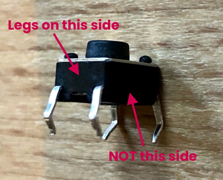Tactile buttons have legs attached on two sides